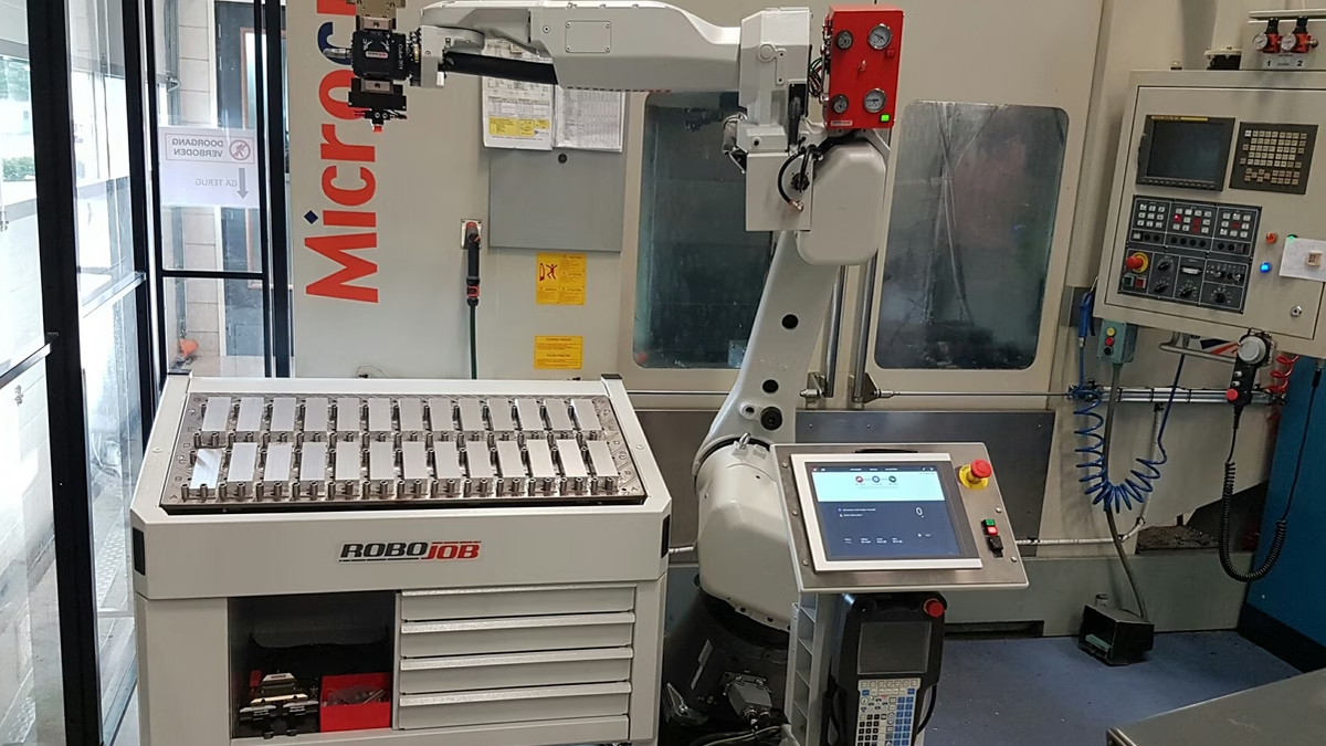 Job Catcher Machine RoboJob provides CNC automation for challenger-microcut CNC machines ...